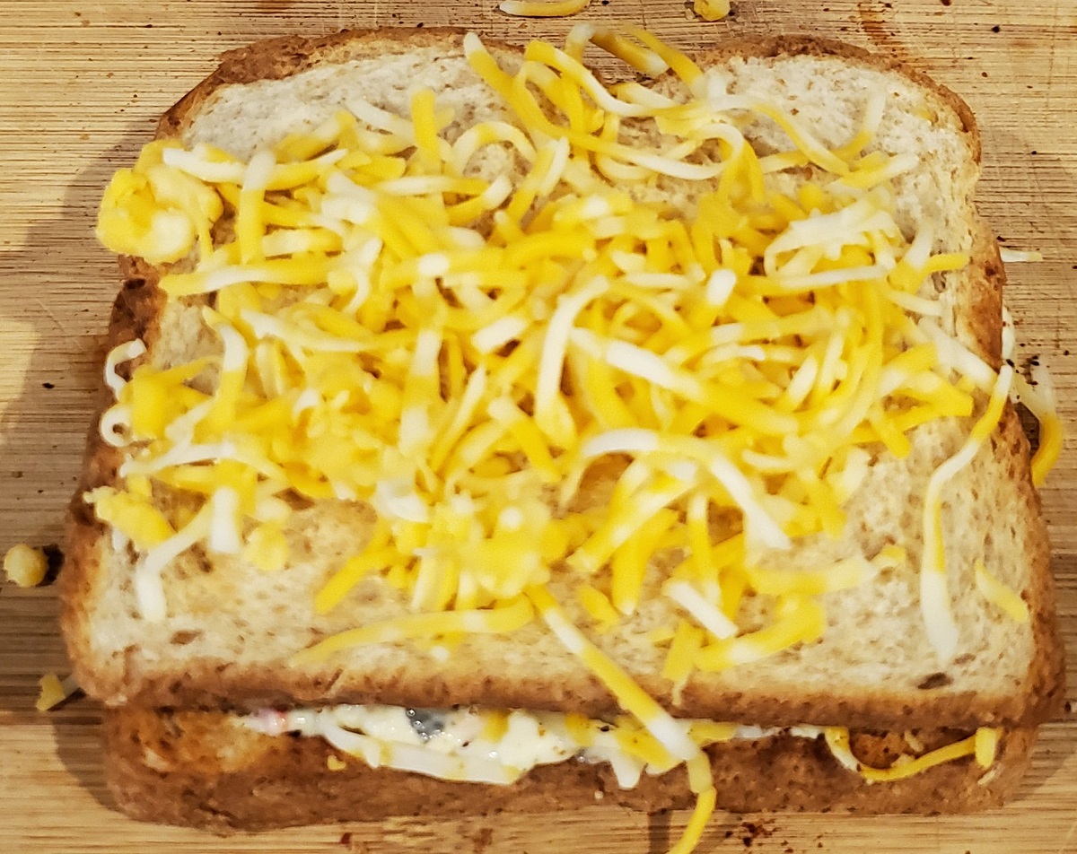 sprinkle cheese on top slice again